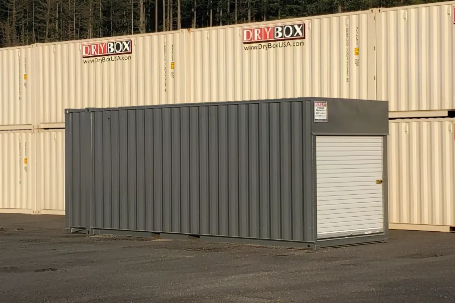 A modified Dry Box container with a white roll-up door