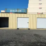 40ft rollup door container with one storage bay open