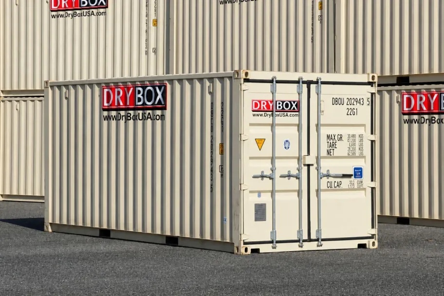 A shipping container sprayed with a full DTM coat and Dry Box logo