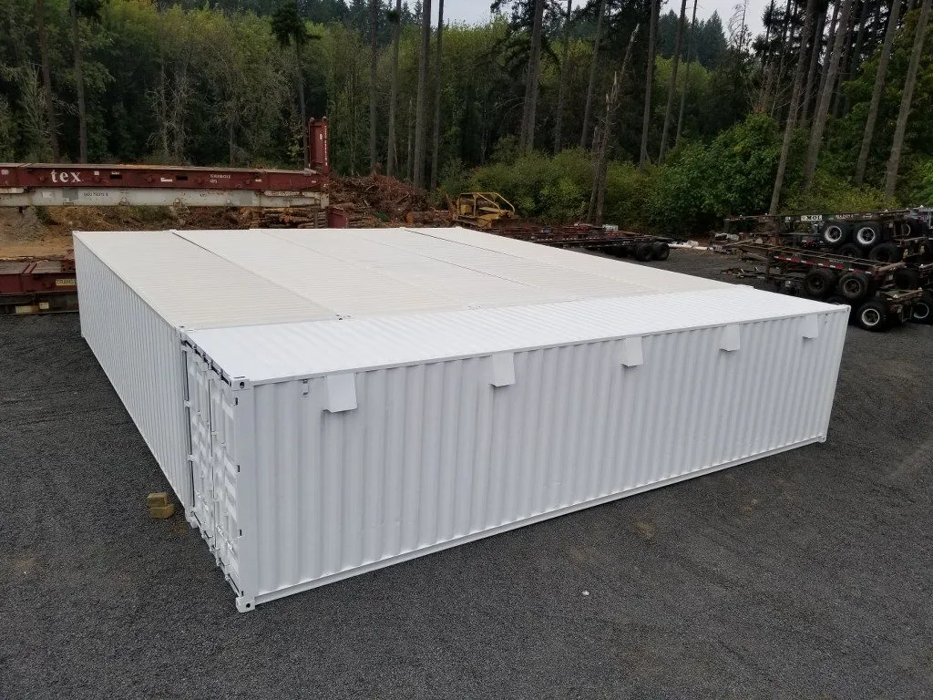white shipping containers in industrial yard