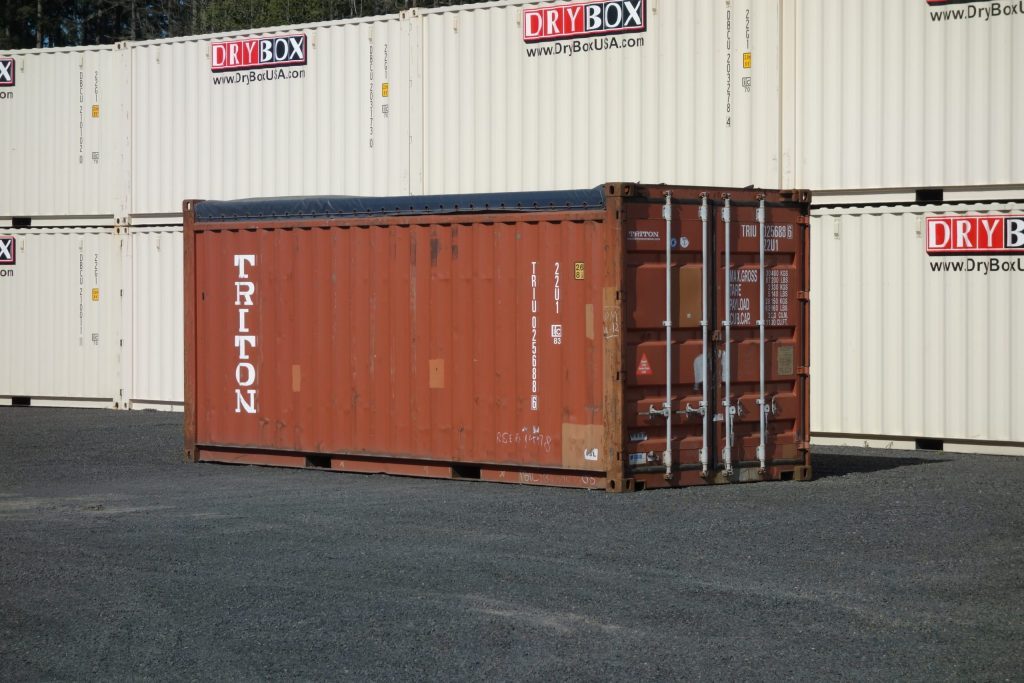 burnt red shipping container