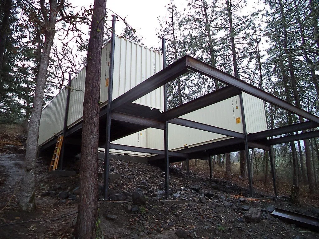 shipping containers in the trees