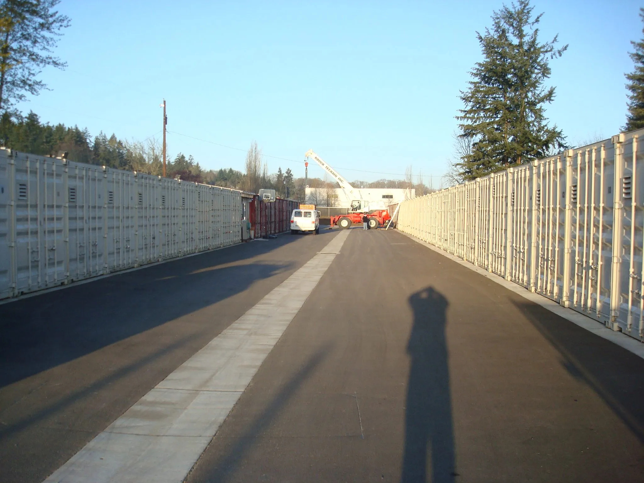 industrial shipping container yard with roll doors