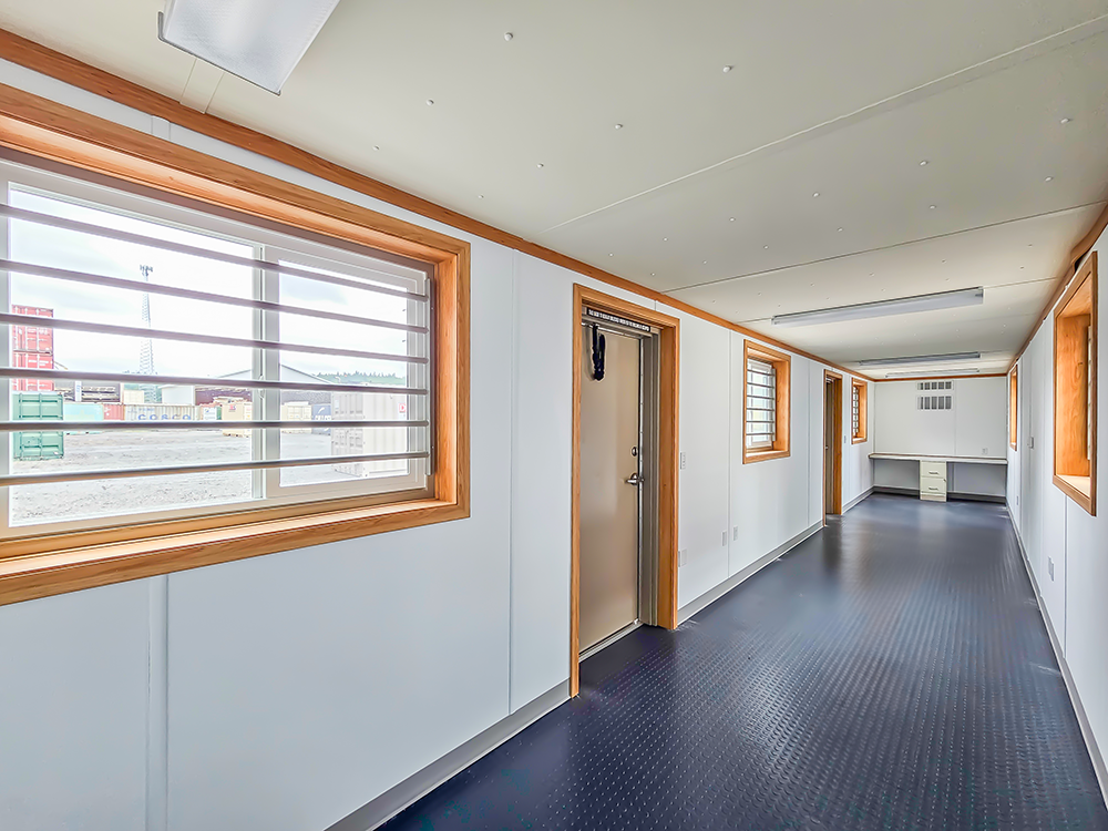 Inside a forty-foot ground level office container