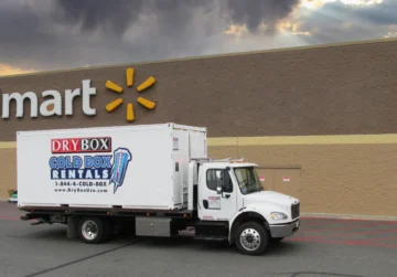 A ten-foot long, white refrigerated container.