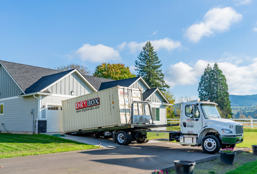 A 20ft container is delivered in a customer's driveway.
