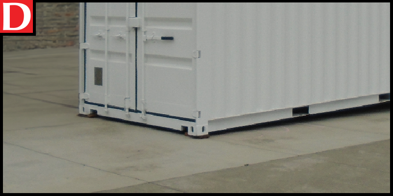 Shipping container on a concrete slab