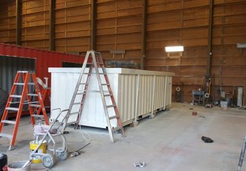 shipping container in a garage workshop