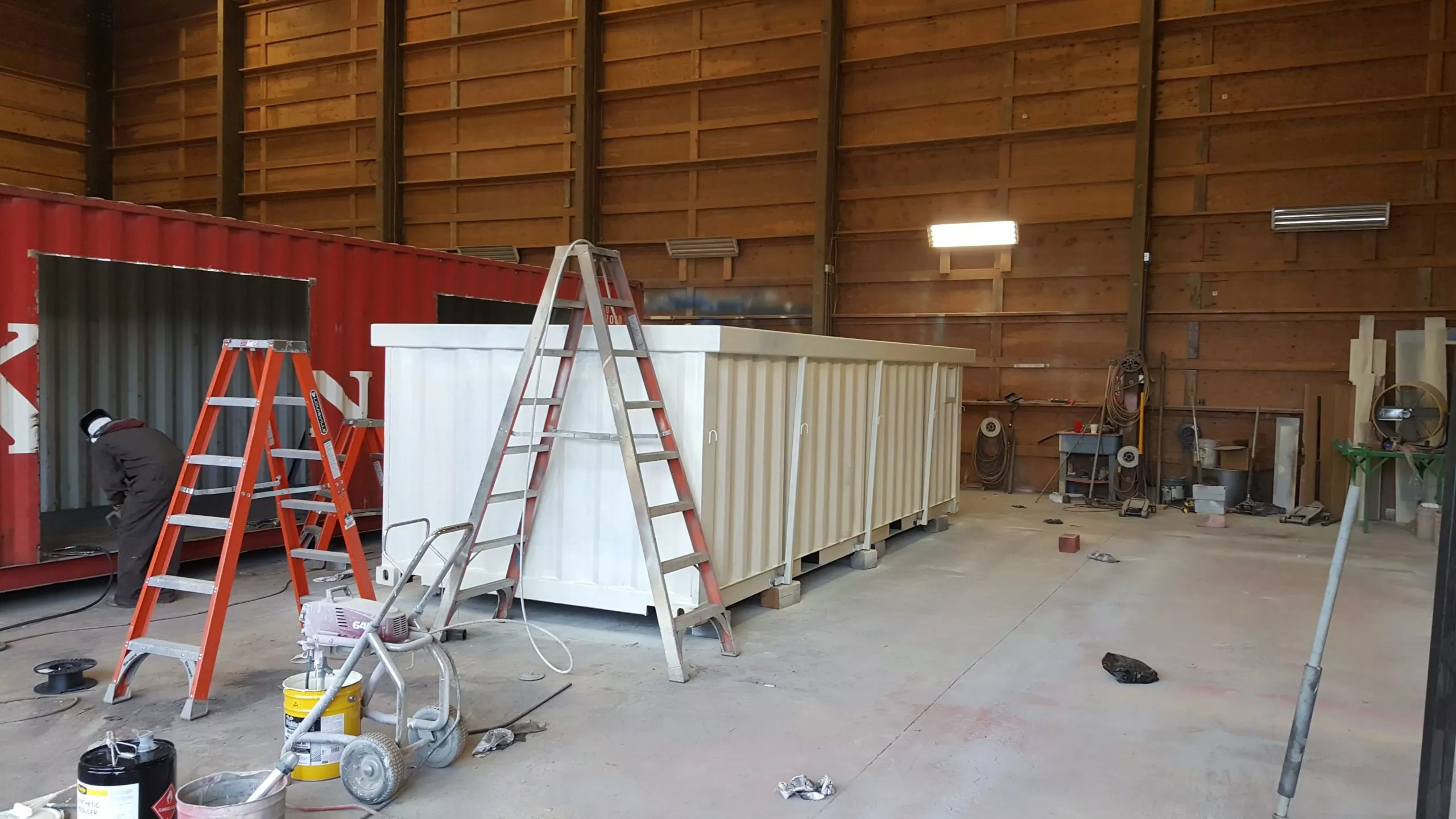 shipping container in a garage workshop