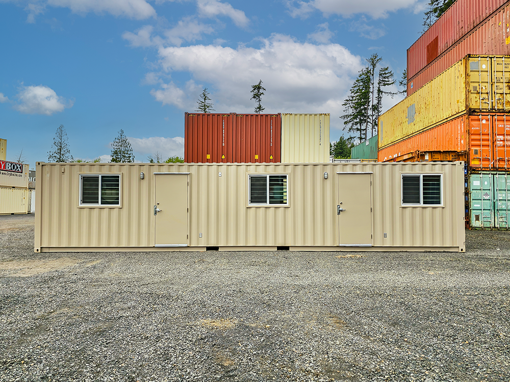 A beige forty-foot ground level office container