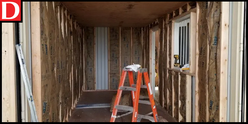 A shipping container insulated with fiber glass