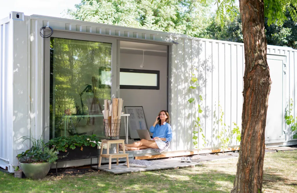 container cabin with a sliding glass door